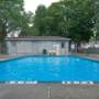 Taunton Terrace in Oshawa, ON outdoor pool with chairs Taunton Terrace in Oshawa, ON outdoor pool with chairs