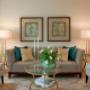 Taunton Terrace in Oshawa, ON stylish living room with beige couch and glass coffee table Taunton Terrace in Oshawa, ON stylish living room with beige couch and glass coffee table