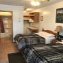 Room with two beds, fridge and microwave. Room with two beds, fridge and microwave.
