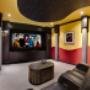 This K&W Home Theater features Dbox motion simulation built into the power Home Theater recliners, a 2:35 aspect masking anamorphic screen, 4K laser projector and a fiber optic Starfield ceiling. Control4 Home Automation. This K&W Home Theater features Dbox motion simulation built into the power Home Theater recliners, a 2:35 aspect masking anamorphic screen, 4K laser projector and a fiber optic Starfield ceiling. Control4 Home Automation.