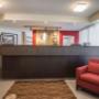 Modern front desk with a helpful and friendly staff Modern front desk with a helpful and friendly staff
