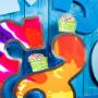 Two cups of ice cream with sprinkles on Ben & Jerry's Logo. Two cups of ice cream with sprinkles on Ben & Jerry's Logo.
