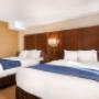 Spacious room with queen beds Spacious room with queen beds
