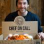 Owner of Chef on Call, Gabe, with a catering box full of Chicken Wings and Shaker Fries Owner of Chef on Call, Gabe, with a catering box full of Chicken Wings and Shaker Fries