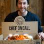 Owner of Chef on Call, Gabe, with a catering box full of Chicken Wings and Shaker Fries Owner of Chef on Call, Gabe, with a catering box full of Chicken Wings and Shaker Fries