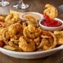 Shrimp Fritto Misto: Over a half pound of shrimp mixed with onions and bell peppers, hand breaded and lightly fried. Served with marinara and spicy ranch. Shrimp Fritto Misto: Over a half pound of shrimp mixed with onions and bell peppers, hand breaded and lightly fried. Served with marinara and spicy ranch.