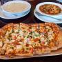 Flatbread appy special with 2 of our homemade bowls of soup Flatbread appy special with 2 of our homemade bowls of soup