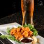 Uploaded by visitor on 4/23/2016 - Dusted Shrimp Appetizer and Draught Beer Uploaded by visitor on 4/23/2016 - Dusted Shrimp Appetizer and Draught Beer