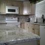 Bianca Crema Granite with Full Height Backsplash atop existing kitchen cabinets. Bianca Crema Granite with Full Height Backsplash atop existing kitchen cabinets.