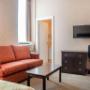 Spacious room with flat-screen television Spacious room with flat-screen television