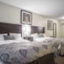 Spacious room with queen beds Spacious room with queen beds