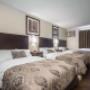 Guest room with three beds Guest room with three beds