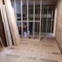 The sub-floor is down. The bathroom wall is roughed in the garage space. The sub-floor is down. The bathroom wall is roughed in the garage space.
