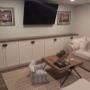 Practical storage can now be utilized in this beautiful basement renovation. Practical storage can now be utilized in this beautiful basement renovation.