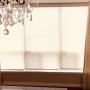 Roller shade done in a Pickering condo covering functionality of glare control and adding beauty to the decor with side panels. Roller shade done in a Pickering condo covering functionality of glare control and adding beauty to the decor with side panels.