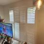 Framed Vinyl Shutters with Bi-Fold, 3 ½” Louvers, and a Divider Rail on a Patio Door in a Thornhill Home Framed Vinyl Shutters with Bi-Fold, 3 ½” Louvers, and a Divider Rail on a Patio Door in a Thornhill Home