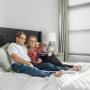 Experience ultimate comfort with automated shades – control your tall, hard-to-reach windows without leaving the coziness of your bed. Convenience has never been so effortless! Experience ultimate comfort with automated shades – control your tall, hard-to-reach windows without leaving the coziness of your bed. Convenience has never been so effortless!