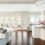 Roller Shades installed in a bright, open kitchen space Roller Shades installed in a bright, open kitchen space