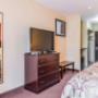 Guest room with flat-screen television Guest room with flat-screen television