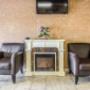 Relax by the fireplace in the lobby Relax by the fireplace in the lobby