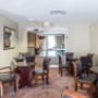 Enjoy breakfast in this seating area Enjoy breakfast in this seating area