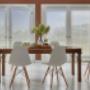 Faux wood blinds complement any dining area. Faux wood blinds complement any dining area.
