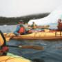 Kayak on the Atlantic Ocean with icebergs Kayak on the Atlantic Ocean with icebergs