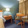 Guest room with table and chairs Guest room with table and chairs