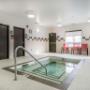 Indoor pool with hot tub Indoor pool with hot tub