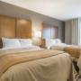 Guest room with queen beds Guest room with queen beds