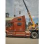 Truck and crane at industrial site – Coordinated heavy haul and on-site unloading. Truck and crane at industrial site – Coordinated heavy haul and on-site unloading.
