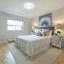 Spacious bedroom with hardwood flooring at 2300 Marine Drive Apartments in Oakville, ON Spacious bedroom with hardwood flooring at 2300 Marine Drive Apartments in Oakville, ON