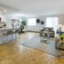 Large living room with hardwood flooring and balcony access at 2300 Marine Drive Apartments in Oakville, ON Large living room with hardwood flooring and balcony access at 2300 Marine Drive Apartments in Oakville, ON
