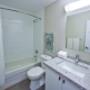 Bathroom with premium fixtures and tub shower at 2300 Marine Drive Apartments in Oakville, ON Bathroom with premium fixtures and tub shower at 2300 Marine Drive Apartments in Oakville, ON
