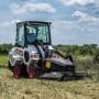 A Bobcat L23 with a Brushcat attachment A Bobcat L23 with a Brushcat attachment