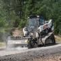 A tracked Bobcat T86 with planer attachment A tracked Bobcat T86 with planer attachment