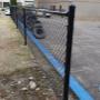 Black powder coated chain link fence install Black powder coated chain link fence install