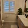 Isn’t this bathroom inviting? It’s got a clean, modern but relaxed vibe—and that’s thanks in part to the Composite Shutters we installed on the window! Isn’t this bathroom inviting? It’s got a clean, modern but relaxed vibe—and that’s thanks in part to the Composite Shutters we installed on the window!