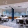 Modern office space at AMA Centre in Westbrook Mall, Calgary, featuring two workstations separated by a decorative blue partition. Modern office space at AMA Centre in Westbrook Mall, Calgary, featuring two workstations separated by a decorative blue partition.