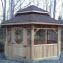 Gazebo Québec - Le Orford - 8 cotés - 16' Abris avec toiture double et bas de mur plein. Gazebo Québec - Le Orford - 8 cotés - 16' Abris avec toiture double et bas de mur plein.